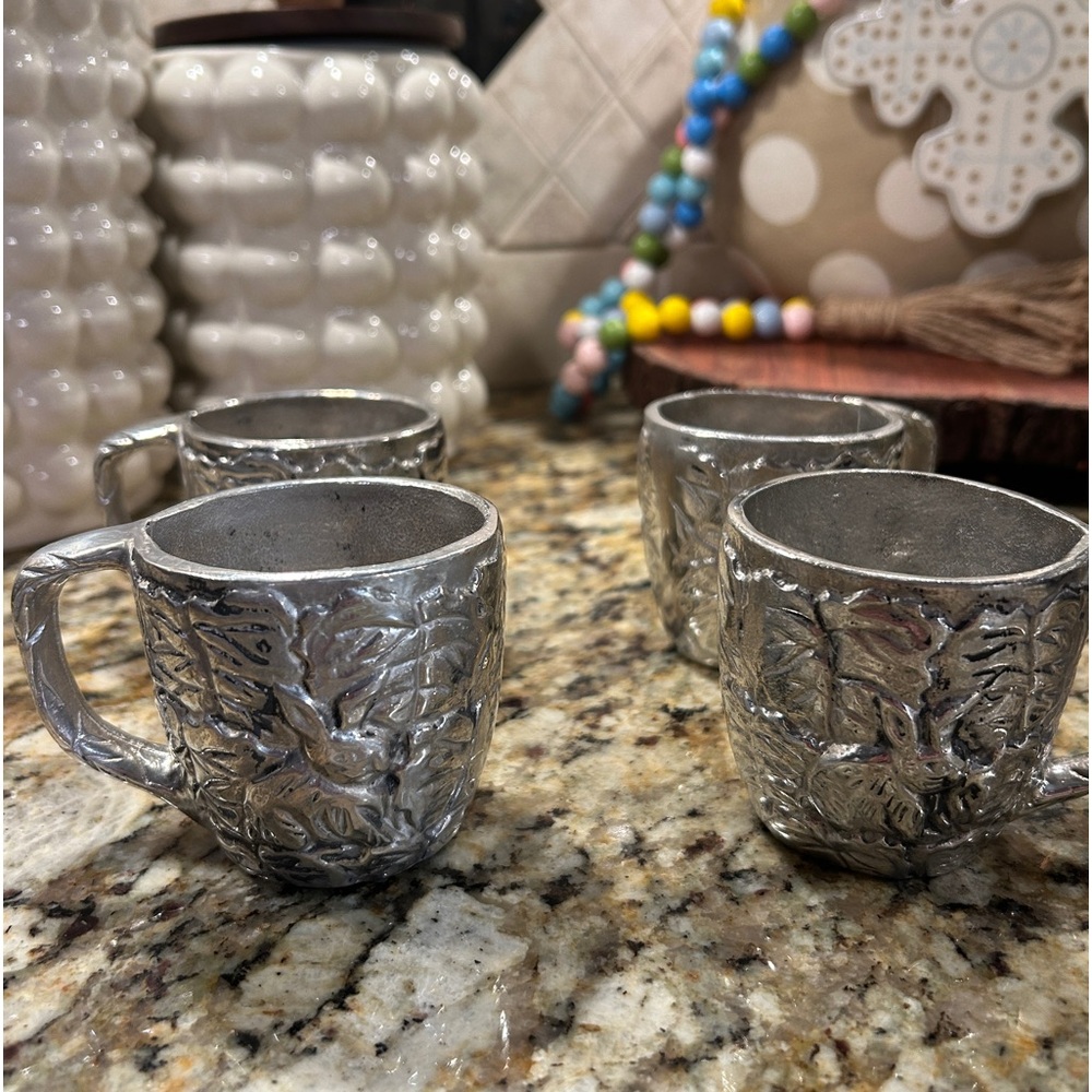 Four CBK Ltd. pewter bunny teacups. Perfect for Spring or Easter entertaining.
